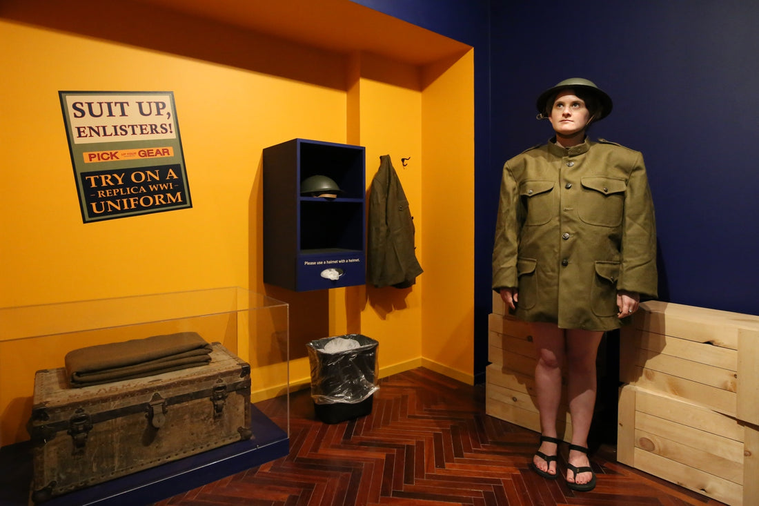 Anne Ewbank trying on a replica WWI uniform at the Knights of Columbus Museum
