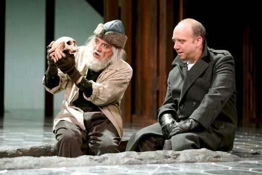 Jarlath Conroy as the Gravedigger and Paul Giamatti as Hamlet. Photographed by Joan Marcus.