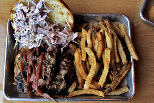 Brisket Sandwich and Cajun Fries at Bull & Swine