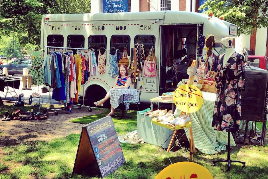 Melissa Gonzales sits outside The Vintanthromobile